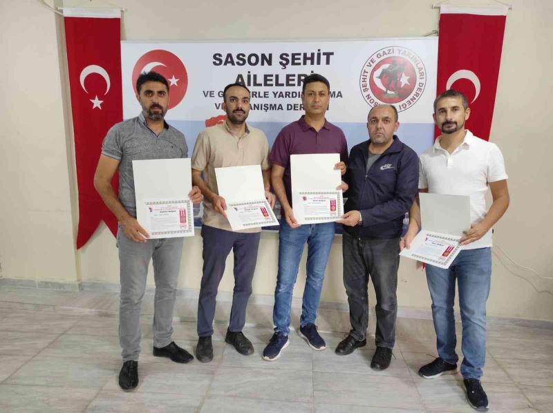 Şehit yakınları, liyakatlı kurum çalışanlarına onur belgesi verdi
