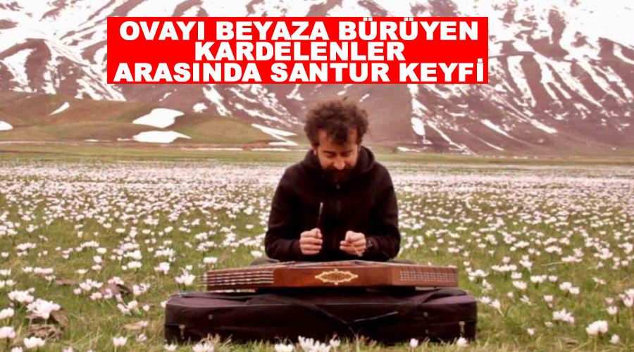 Ovayı beyaza bürüyen kardelenler arasında santur keyfi