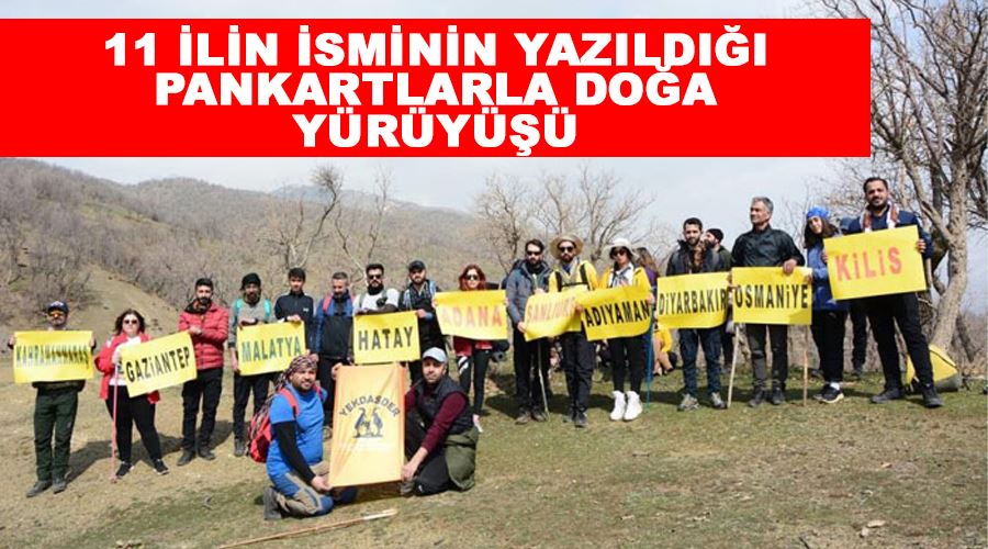 11 ilin isminin yazıldığı pankartlarla doğa yürüyüşü