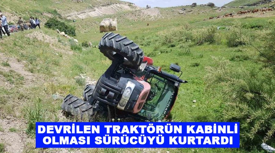 Devrilen traktörün kabinli olması sürücüyü kurtardı